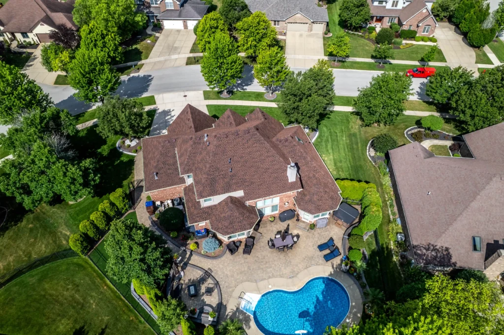 Aerial drone view of a completed roof replacement by Clearway Exteriors in Palos Hills, IL