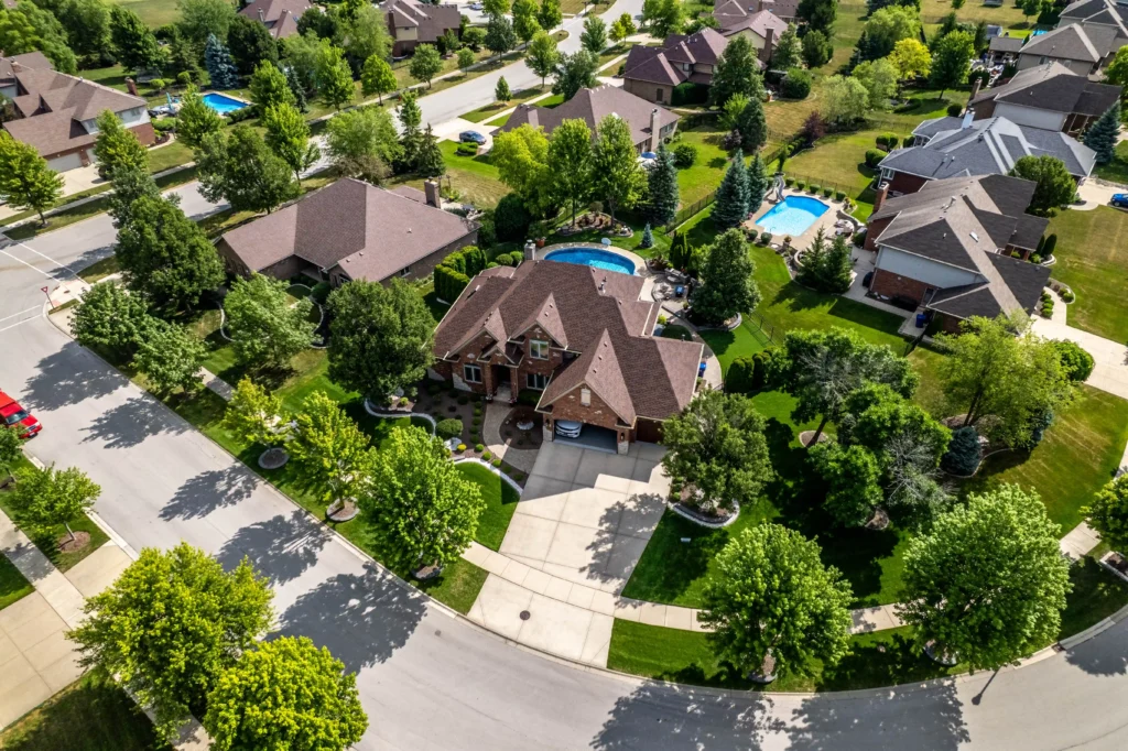 Aerial drone view of a completed roof replacement by Clearway Exteriors in Palos Park, IL